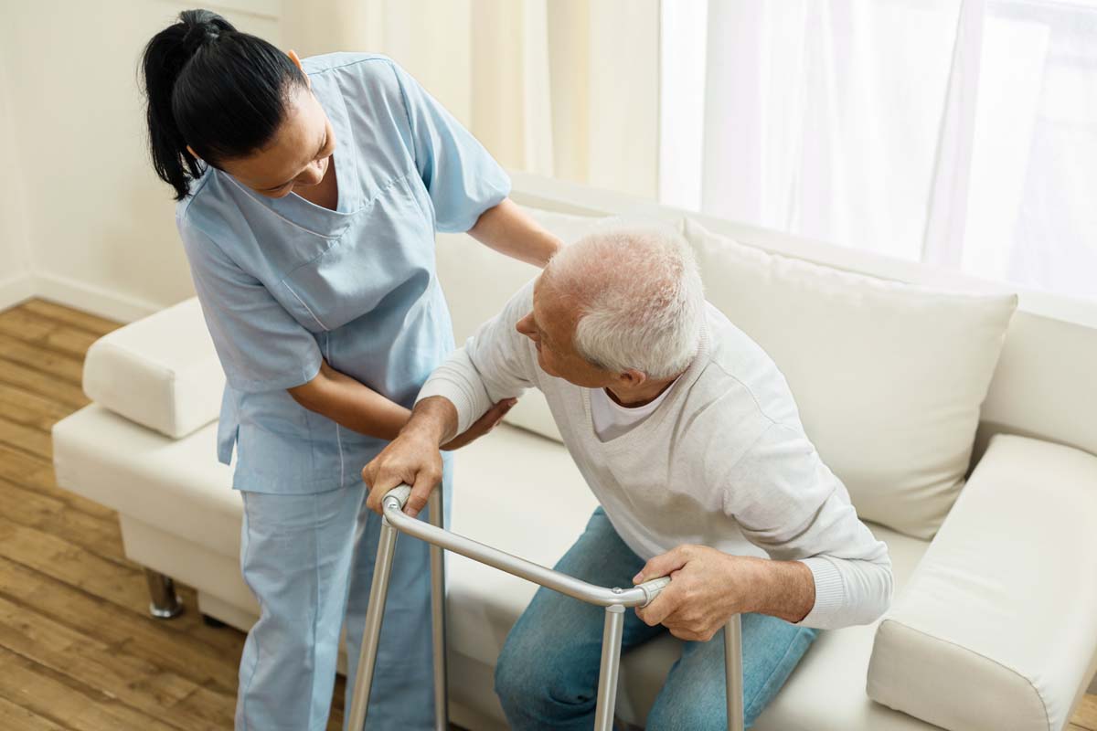 Caregiver assisting elderly